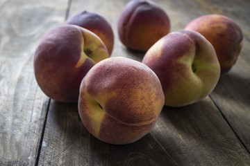 Group of ripe red peaches