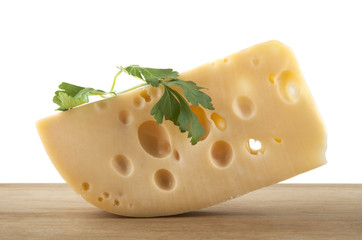 Cheese on a wooden board isolated on a white background