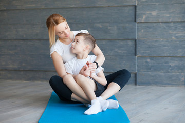 Fitness mother with her 9 years old son