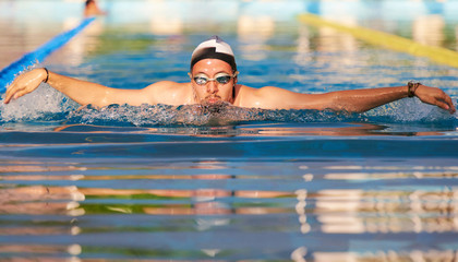 Man swimming butterfly style
