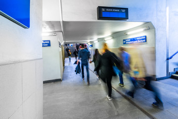 Movement in the railway subway. People rushing home from the train station.
