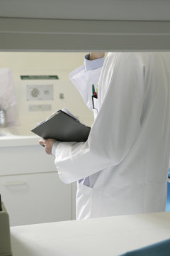DOCTOR WITH MEDICAL RECORD