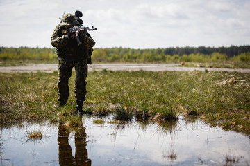 Photo of man with gun