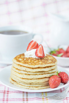 Summer breakfast with pancakes and raspberries
