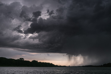 The storm and rain are coming to the river