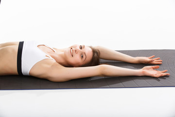 Fototapeta premium Young woman exercise yoga supported headstand