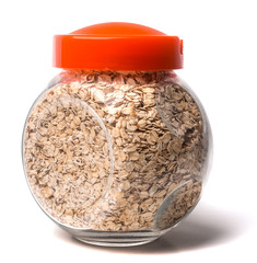 Glass jar with rolled oats isolated on white background glass jar with oatmeal flakes isolated