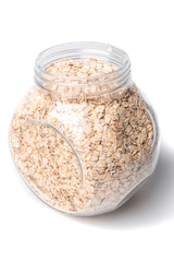 Opened glass jar with rolled oats isolated on white background glass jar with oatmeal flakes isolated