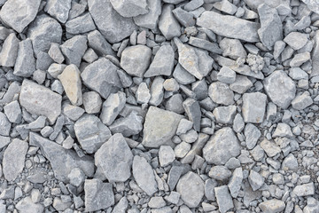 Pebbles background. Stone top view texture.