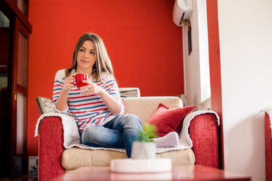 Young woman having coffee