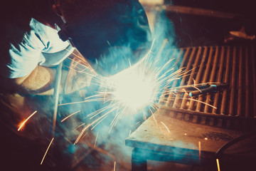 Welding Work. Erecting Technical Steel Industrial Steel Welder In Factory. Craftsman. Soft focus....