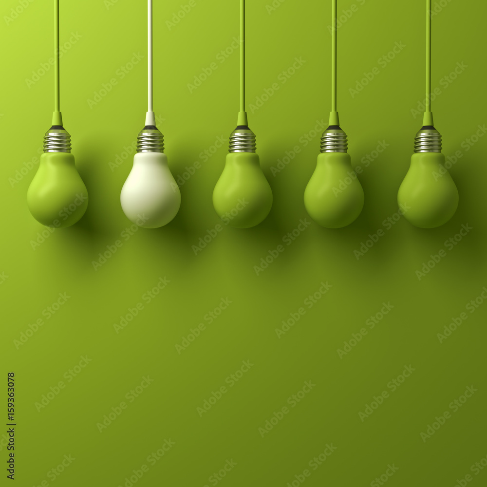 Poster one white hanging light bulb different and standing out from green incandescent bulbs on green backg