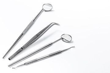 dentist office with tools for teeth care on white background top view mock up