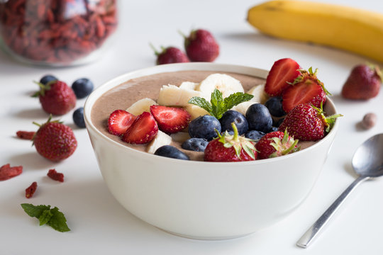 Summer breakfast - breakfast bowl with strawberries and blueberries