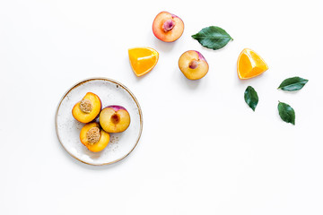 woman summer breackfast with orange and peach fruits on plates on white background flat lay mockup