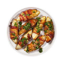 Bacon Wrapped Potatoes Wedges with Parsley Garlic Pesto Sauce Isolated on White background