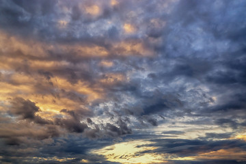 Naklejka na ściany i meble Dramatic cloudyscape in evening