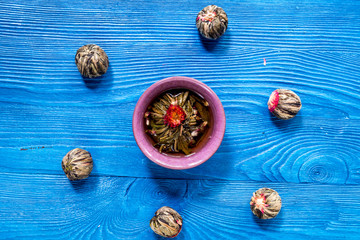 Drink herbal tea with brew blue wooden table background top view