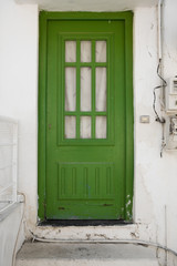 Green door in an old building