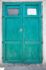 Obraz na płótnie Canvas Blue door in an old building
