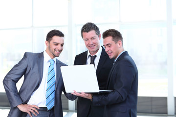 Confident business partners working in office and talking