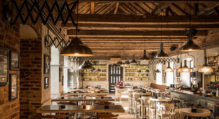 Wodden ceiling and lamps in coffee restaurant interior
