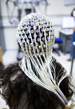 Close-up of patient's head covered with electrodes of EEG