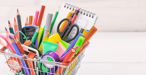 School shopping basket on white background