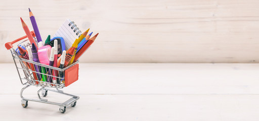 School shopping cart on white background