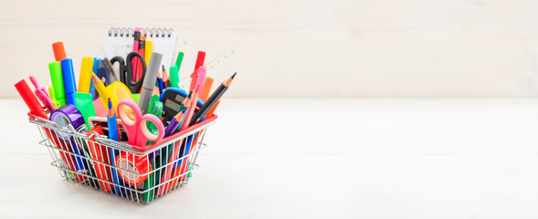 School shopping basket on white background