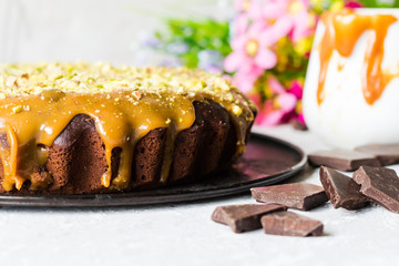Chocolate cake with pistachios and salted caramel