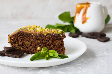 Chocolate cake with pistachios and salted caramel