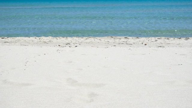 White Wild Mediterranean Sea Beach in Italy woth Clear Blue Water