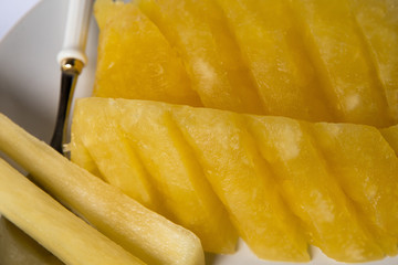 Pineapple piece isolated on white background