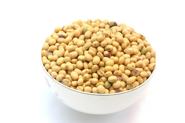 dry soybean in the bowl isolated on white background