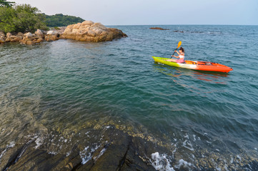 Women kayaking in the sea