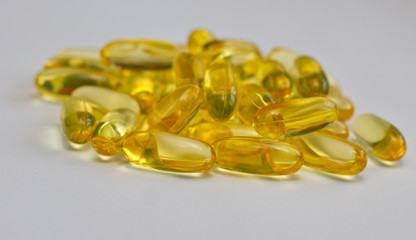 Cod liver oil omega 3 gel capsules isolated on white background