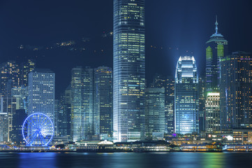 Fototapeta na wymiar High rise modern buildings in Hong Kong city at night