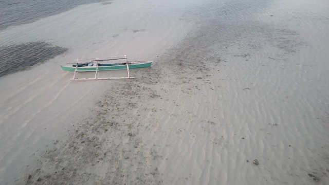 Bohol - April 2017: Pump boat on shallow sea. Philippines. 4K resolution