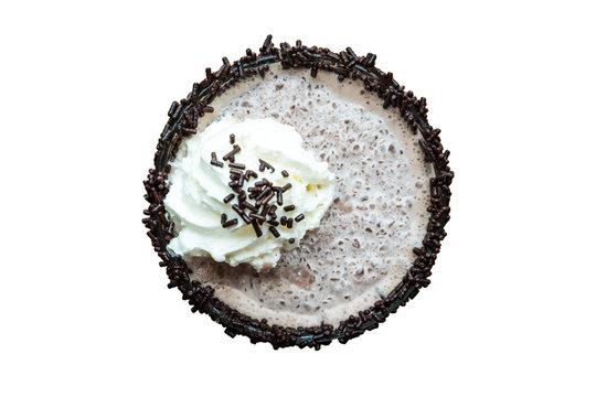 Top view of chocolate frappe with whipped cream isolated on white background
