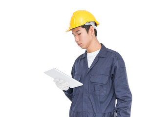 Worker using a tablet and holding blueprint on white