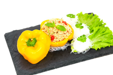 healthy salmon salad with lemon dressing and yellow bell peper. This meal is a clean food.