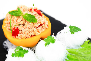 healthy salmon salad with lemon dressing and yellow bell peper. This meal is a clean food.