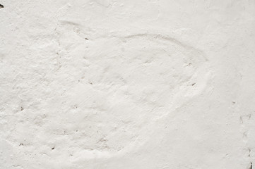 The white wall covered with cement