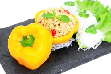 healthy salmon salad with lemon dressing and yellow bell peper. This meal is a clean food.