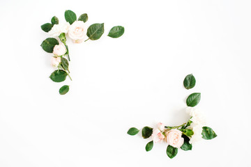 Border frame with beige rose flower buds and green leaves isolated on white background. Flat lay, top view. Floral background