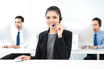 Young Asian woman as an operator in call center