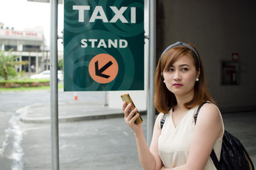 A woman waiting for uber