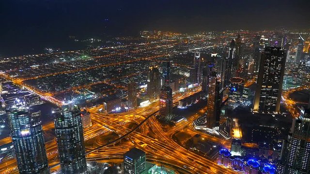 Busy traffic scene in the rush hour on Sheikh Zayed Road, Dubai's main road artery, night time lapse