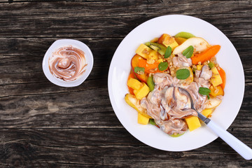 fruit salad and yogurt with muesli